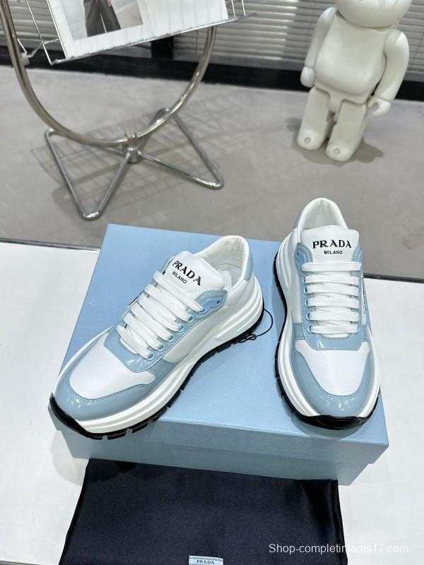 2025 Women Prada Light Blue White Leather Sneakers KFY00310